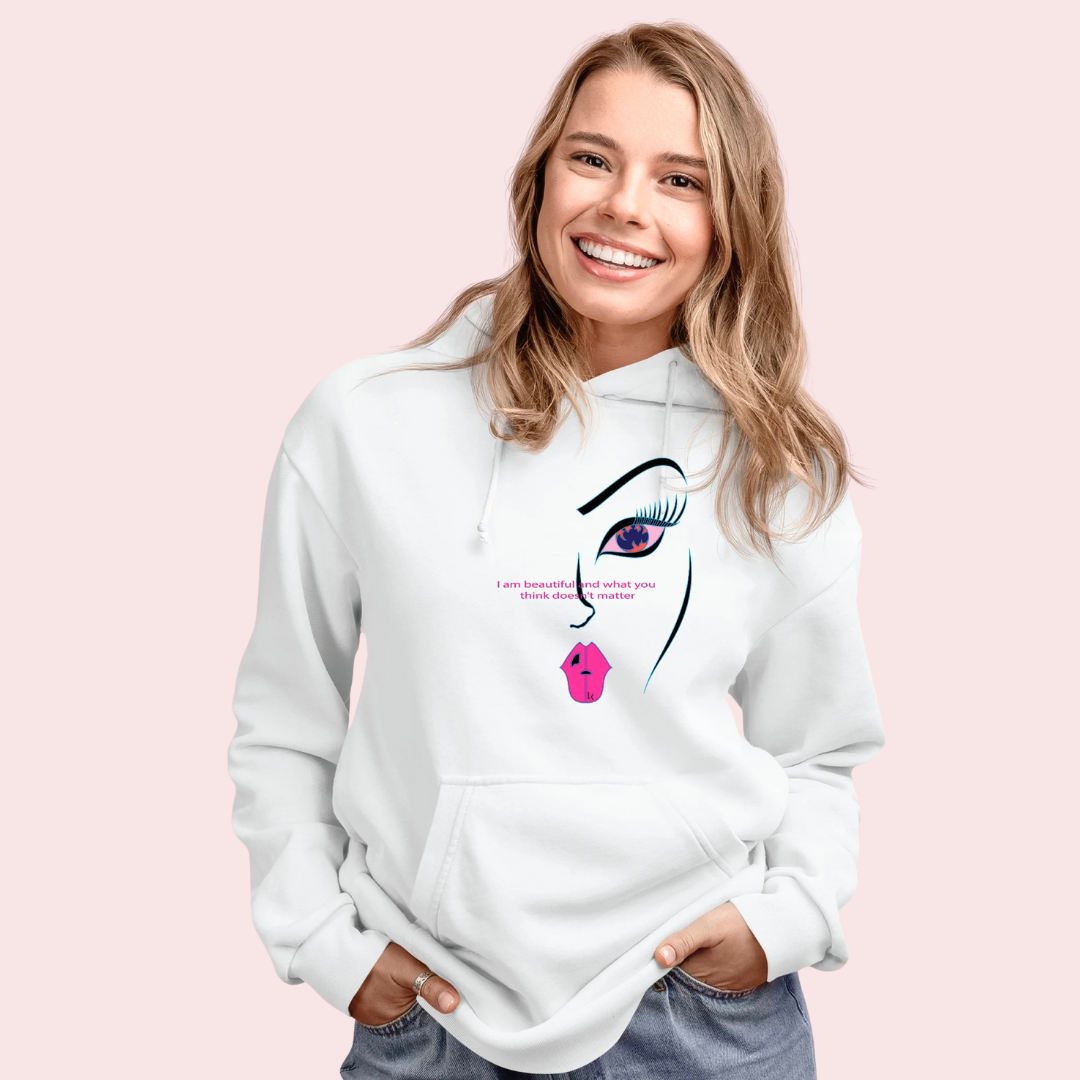 Woman wearing a white hoodie with a graphic design on a pink background